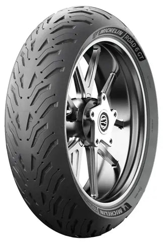 Michelin Road 6 180/55/17 rear motorcycle tire with tread pattern on black rubber surface.