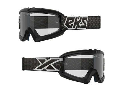 X-GROM Clear Youth MX goggles with black and white frame and tinted lens, designed for motocross riding.