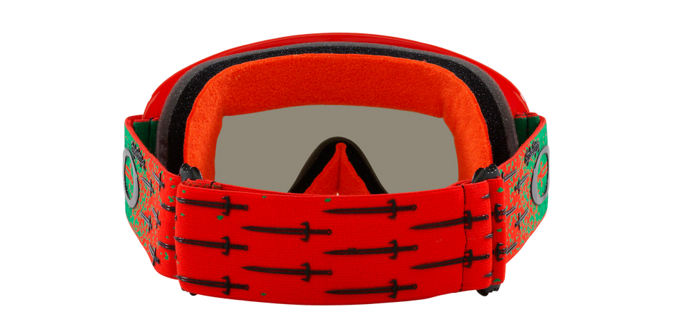 O-Frame® MX Troy Lee Designs Series goggles with clear lens, black frame, and adjustable strap for motocross riding by Oakley