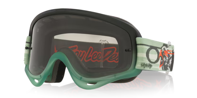 Oakley O-FRAME MX Tribe W/Clear MX goggles with clear lens and adjustable strap for off-road motocross riding.