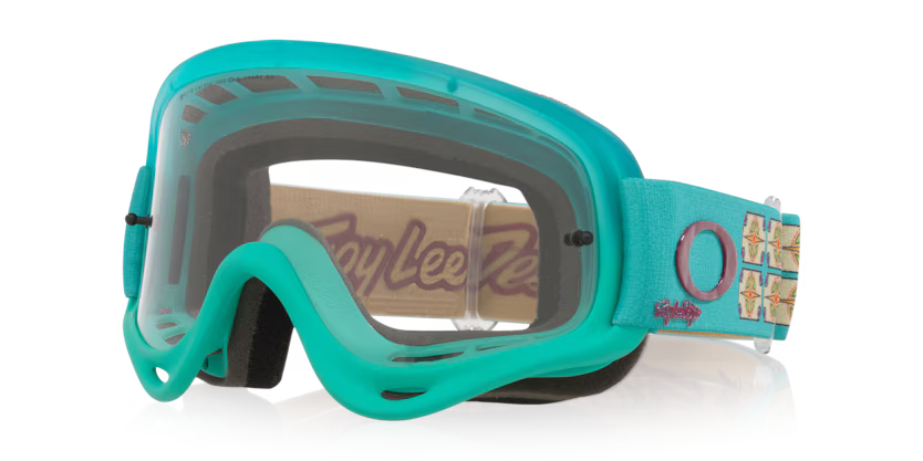 Oakley O-FRAME MX Falcon goggles with light gray lenses, featuring a sleek black frame and adjustable strap for motocross riding.