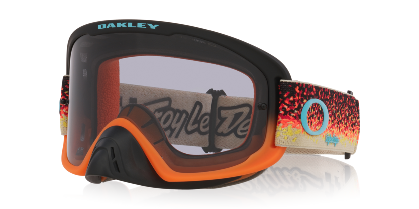 Oakley O-Frame PRO MX goggles in black and orange with light gray lenses, designed for motocross riding.