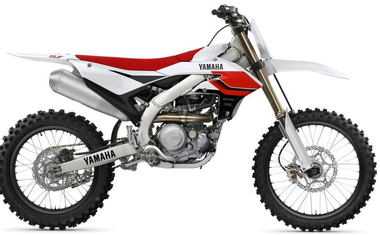Yamaha YZ450F 70th Anniversary dirt bike with blue and white graphics, off-road tires, and sporty design.