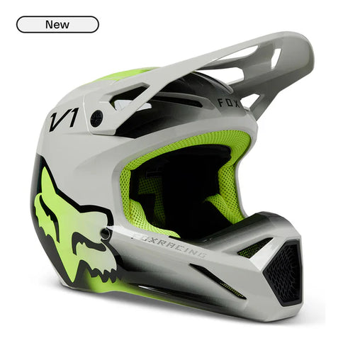 FOX V1 TOXSYK youth motocross helmet in starlight gray with ventilation and adjustable straps, designed for young riders.