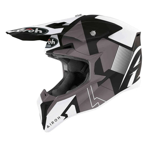 AIROH WRAAP Raze MX helmet in black and white matte finish, featuring a sleek aerodynamic design and secure chin strap.
