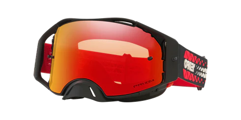 Oakley AIRBRAKE MX goggles with Tread Prizm Torch lens, clear view, black frame, and protective case for motocross riding.