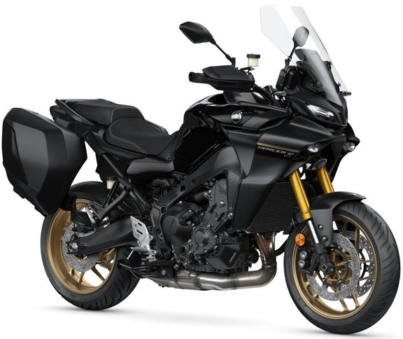 Yamaha Tracer 900 GT sports touring motorcycle in sleek Midnight Black, shown from a side angle in a studio setting.