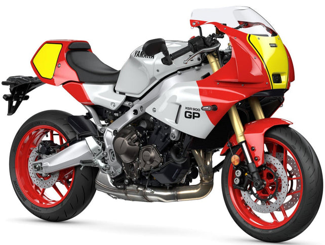 Red Yamaha XSR900 GP motorcycle with sleek design and modern features, shown from a 360-degree view.