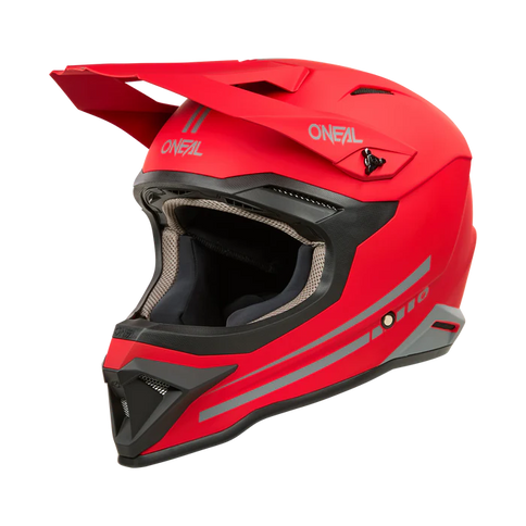 O'NEAL ONEAL 1 SRS MX helmet in red, with a solid design, viewed from the front-left angle.