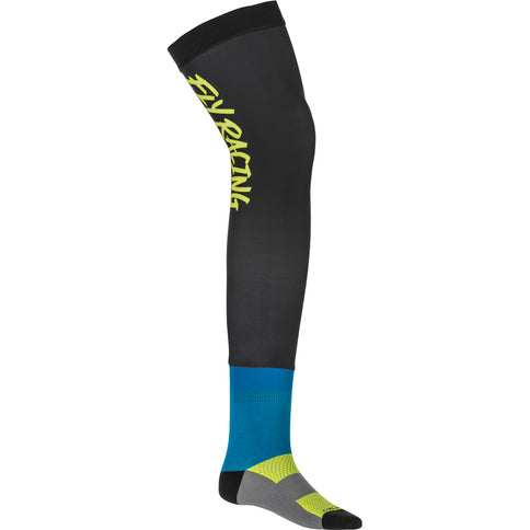Fly Racing MX knee brace socks in hi-vis black and blue with reinforced design, ideal for motocross riders.