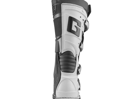 GAERNE GX1 MX boots in black and white, featuring durable design and secure fit for motocross riding.