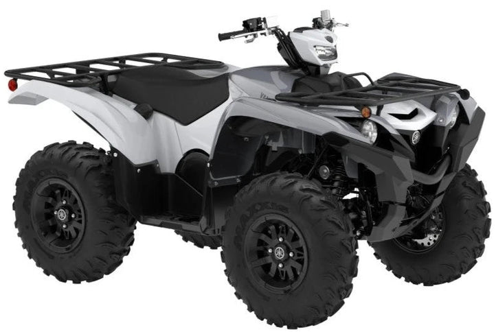 Black Yamaha YFM 700 Grizzly ATV motorcycle with rugged tires and sturdy build, designed for off-road adventures.
