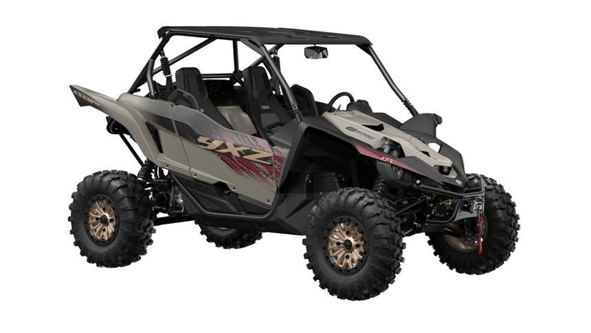 Yamaha YXZ1000R side-by-side off-road vehicle with rugged exterior and sporty design, ready for outdoor adventures.