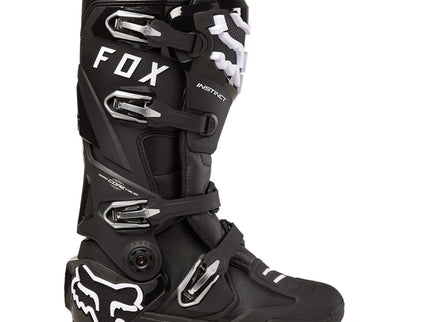 Black FOX Instinct MX boots with sturdy construction, ankle support, and reinforced soles designed for motocross riding.