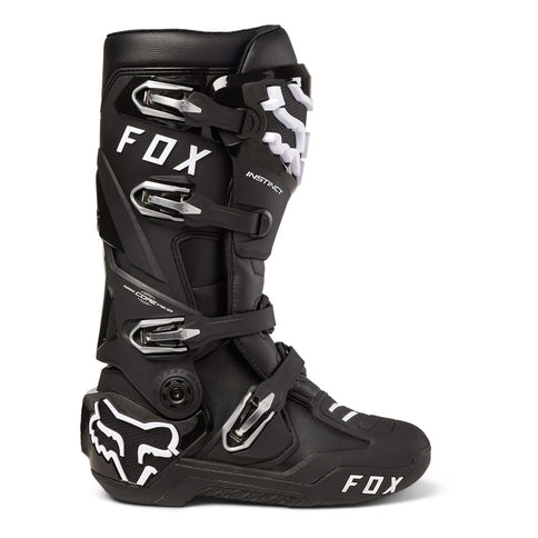 Black FOX Instinct MX boots with sturdy construction, ankle support, and reinforced soles designed for motocross riding.