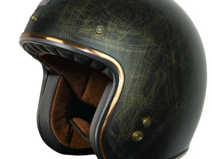 Origine Primo Scacco Bronze road helmet with sleek design and ventilation for cyclists, shown from a side angle.
