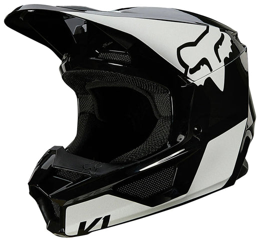 Youth Fox V1 Revn MX helmet in black and white with adjustable straps and ventilation for motocross riding.