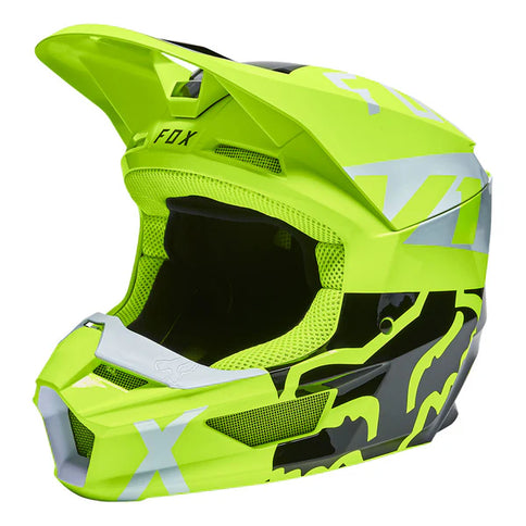 FOX V1 SKEW Youth MX Helmet in vibrant fluorescent yellow with black accents, designed for motocross riding.