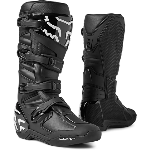 Black FOX COMP CORE MX boots with sturdy design and reinforced ankle support for motocross riding.