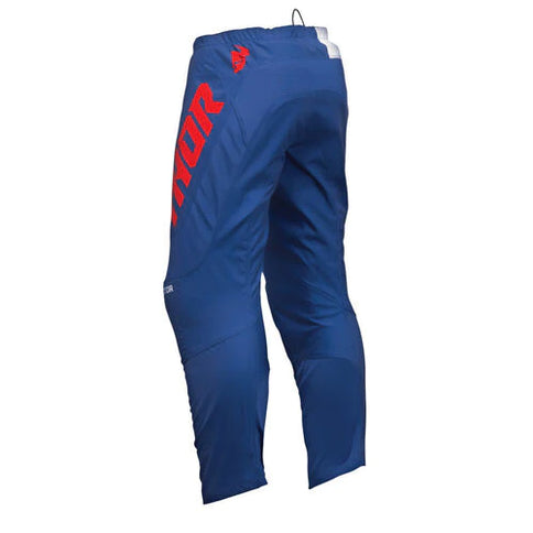 THOR SECTOR Checker MX Pants in red and navy with a bold checkered pattern, designed for motocross riding.