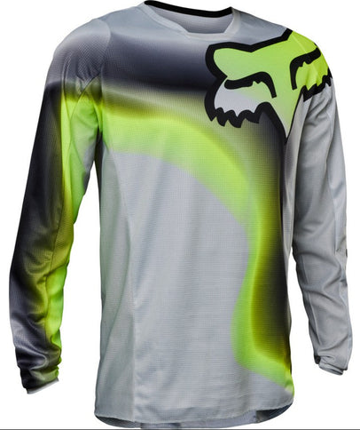 FOX 180 Toxsyk MX Jersey in Flo Yellow, lightweight motocross jersey with vibrant yellow color and breathable fabric.