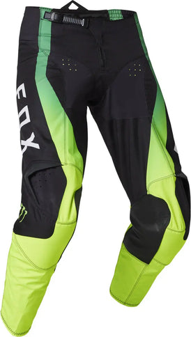 Black FOX 180 Monster MX pants with reinforced knees and flexible fabric for motocross riding.