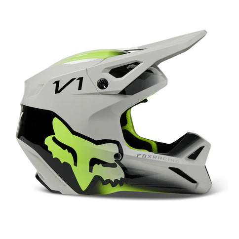 FOX V1 Toxsyk youth motocross helmet in steel gray, featuring ventilation and durable design for young riders.