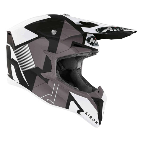 AIROH WRAAP Raze MX helmet in black and white matte, featuring a sleek design with ventilation and adjustable straps.