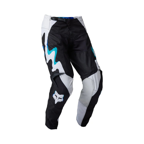 FOX 180 Kozmik MX pants in black and white, durable motocross pants with reinforced knee areas and adjustable waist.