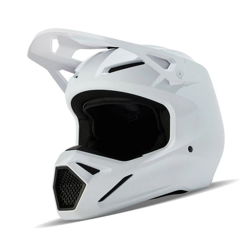 White MX helmet from FOX's V1 SOLID WHITE series, featuring sleek design and durable construction for motocross riding.