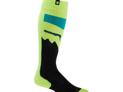 Yellow MX socks for women by FOX featuring the 180 Flora design, made for comfort and style during active wear.