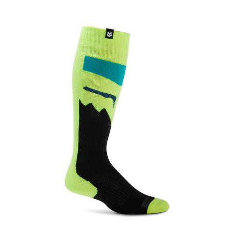 Yellow MX socks for women by FOX featuring the 180 Flora design, made for comfort and style during active wear.