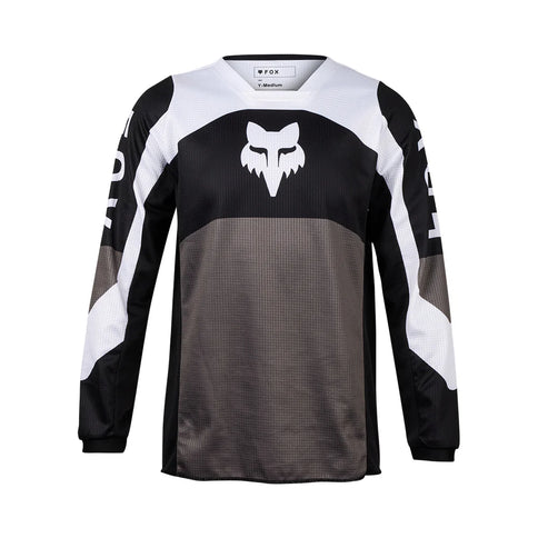 Black and grey FOX180 Nitro youth motocross jersey with FOX logo and sporty design, made for young motocross riders.