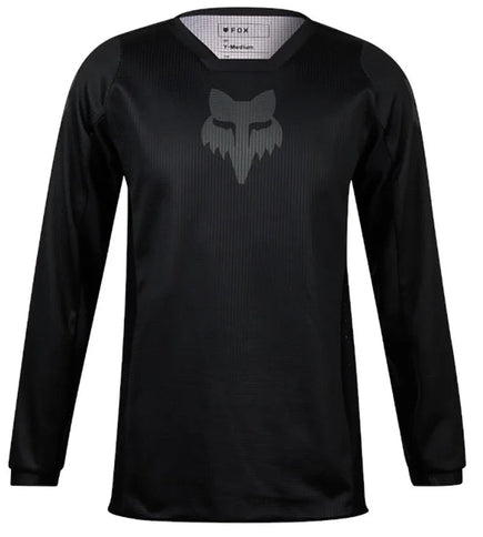Black FOX 180 Blackout Youth MX Jersey with black fabric and FOX logo, designed for motocross riding.
