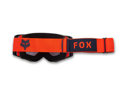 FOX AIRSPACE GOGGLE MX goggles in bright orange with tinted lenses for motocross riding, featuring adjustable straps for a secure fit.