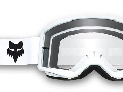 Fox MAIN CORE MX Goggle in white with clear lens, featuring adjustable strap and ventilation for motocross riding.