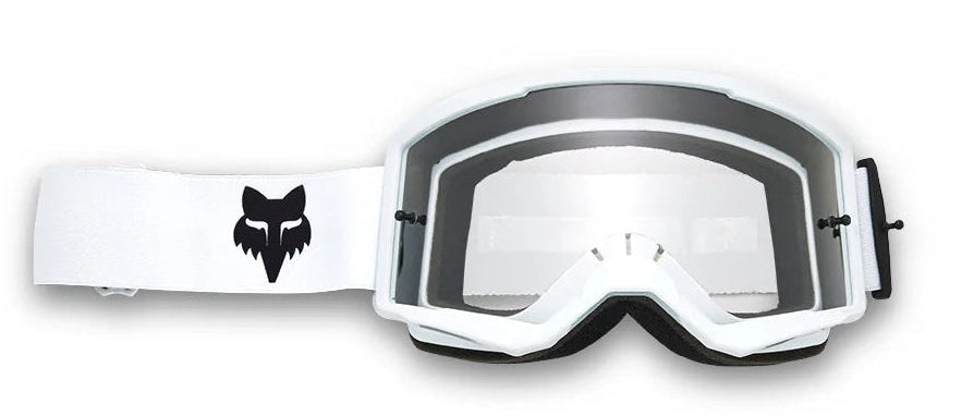 Fox MAIN CORE MX Goggle in white with clear lens, featuring adjustable strap and ventilation for motocross riding.
