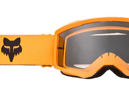 FOX MAIN CORE YOUTH MX Goggle in tangerine with clear lens and adjustable strap, designed for young motocross riders.