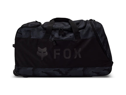 Black camo FOX Shuttle 180 gear bag with multiple compartments and sturdy handles, designed for fishing or outdoor gear storage.