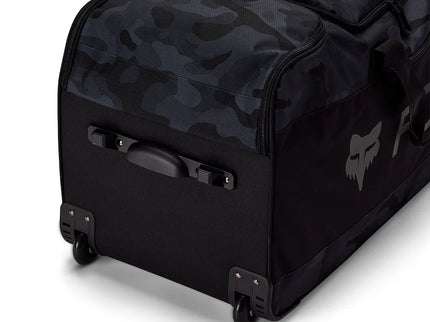 Black camo FOX Shuttle 180 gear bag with sturdy handles and multiple compartments for sports or travel gear.