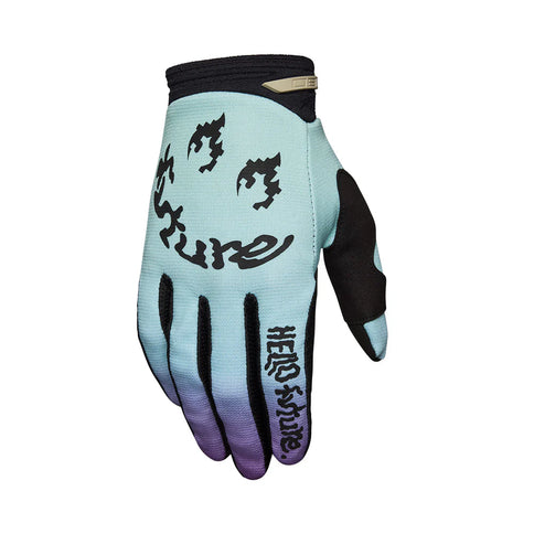 FOX 180 Hello Future MX gloves in light blue, featuring durable construction and flexible design for motocross riding.