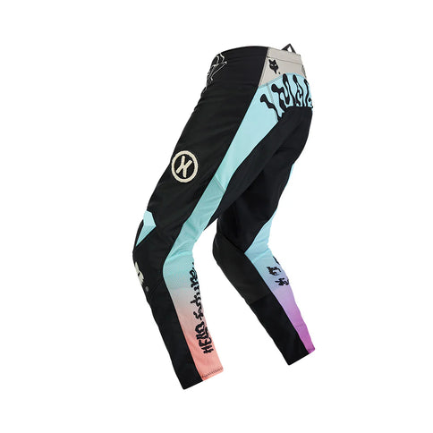 Black FOX MX Pants labeled 180 Hello Future Pant, featuring durable fabric and sleek design for motocross riding.
