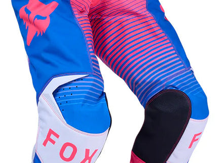 Blue and pink MX pants from FOX, 180 Collect Pant style, featuring durable fabric and sporty design for motocross riding.