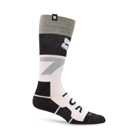 Black FOX MX 360 Tine Sock featuring durable knit fabric and padded areas for comfort during motocross riding.