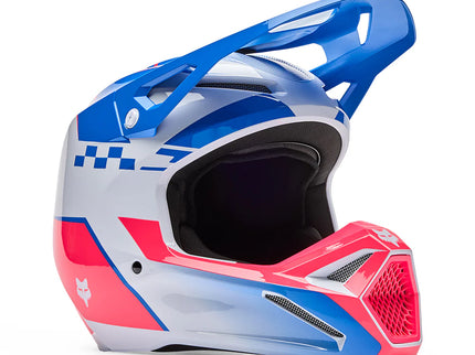 FOX V1 Collect helmet in blue and pink for motocross, featuring a sleek design and adjustable straps.