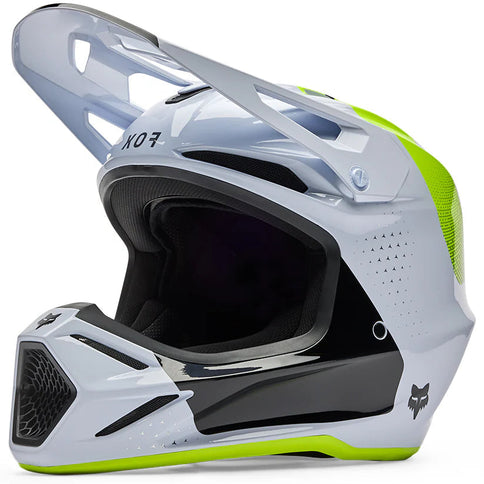 White FOX V3 Tine MX helmet with adjustable strap and ventilation, designed for motocross riders.