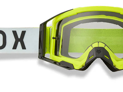 FOX AIRSPACE TINE MX Goggles in Flo Yellow with clear lenses, designed for motocross riding and helmet compatibility.