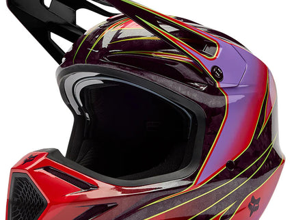 Red FOX V3 RS Canvas MX helmet with adjustable chin strap and venting, designed for motocross riding.