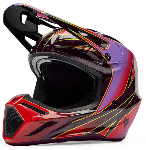 Red FOX V3 RS Canvas MX helmet with adjustable chin strap and venting, designed for motocross riding.