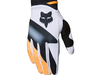 Black and white FOX 180 Noble Youth MX gloves, lightweight motocross gloves with padded palms and adjustable wrist closure.